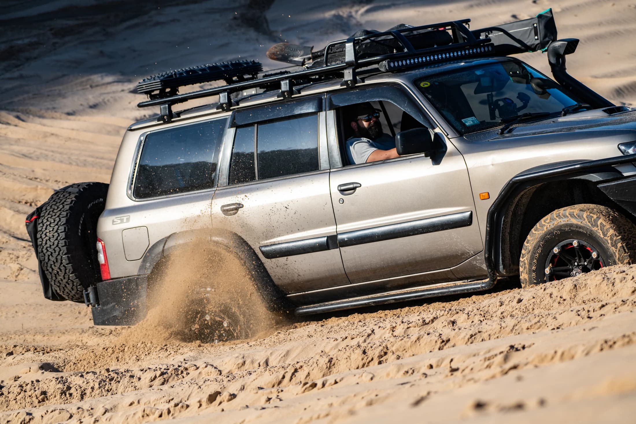 4WD climbing through sand by Croome Photography